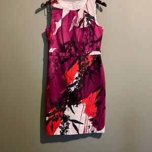 Floral Tahari sheath dress. Fully satin lined. Mid length. Split detail.